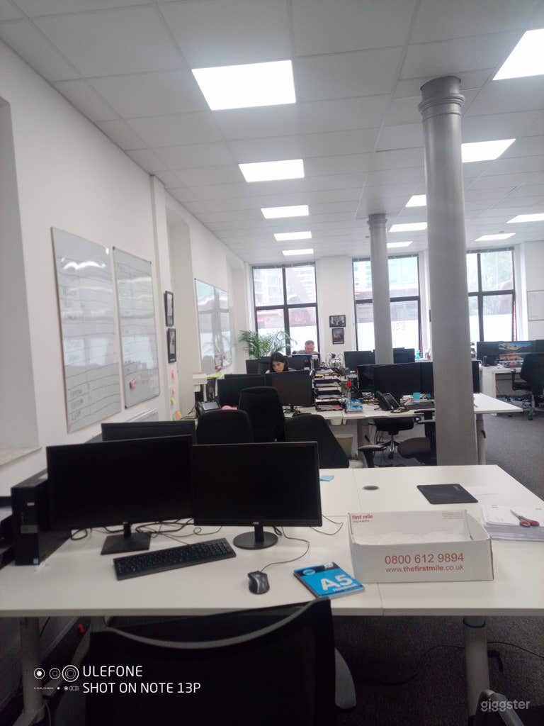  Downstairs Office middle section showing desk space and windows 