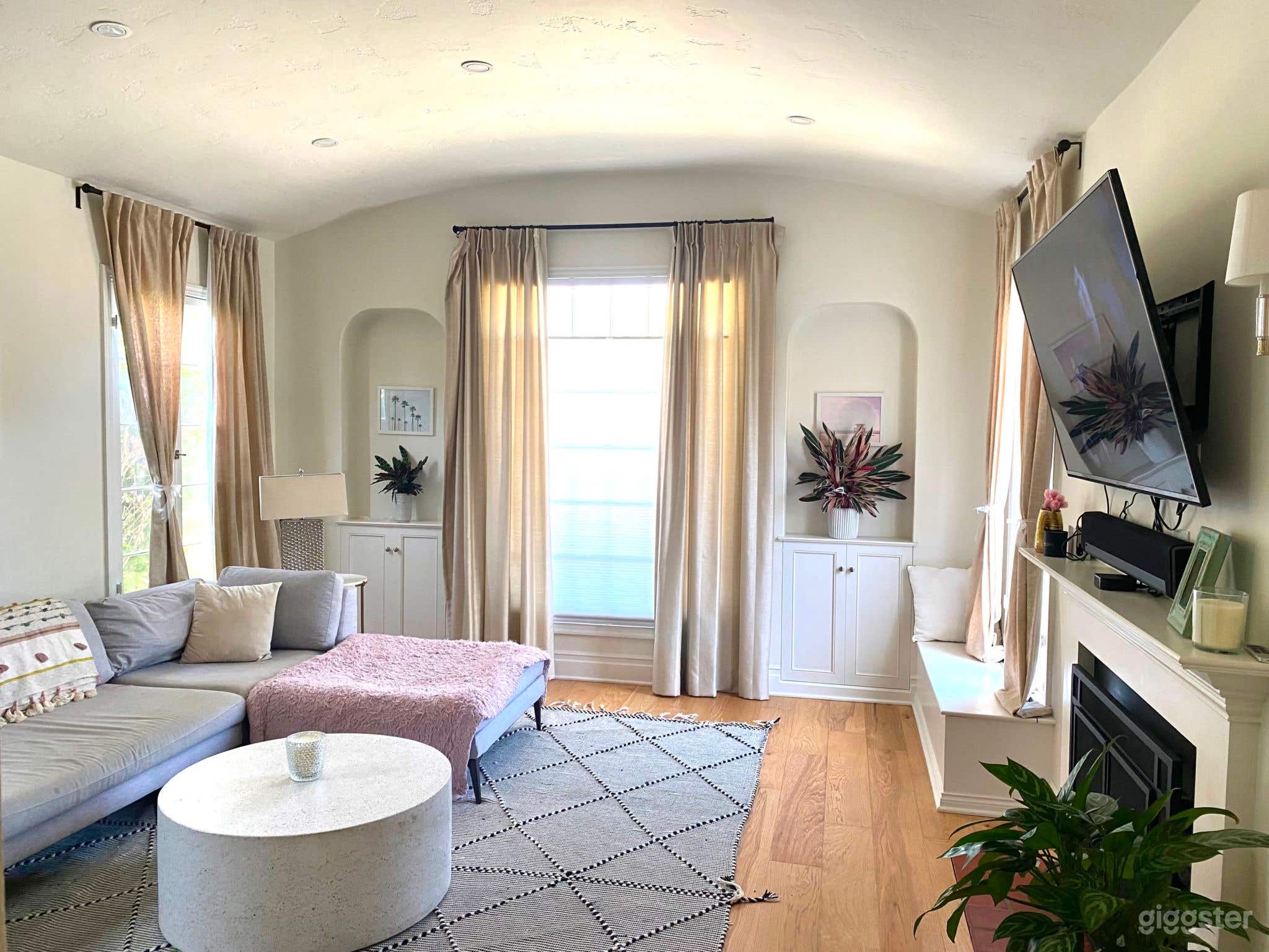 Enchanting Spanish-Style Home with Lush Greenery and Treehouse Photo 1