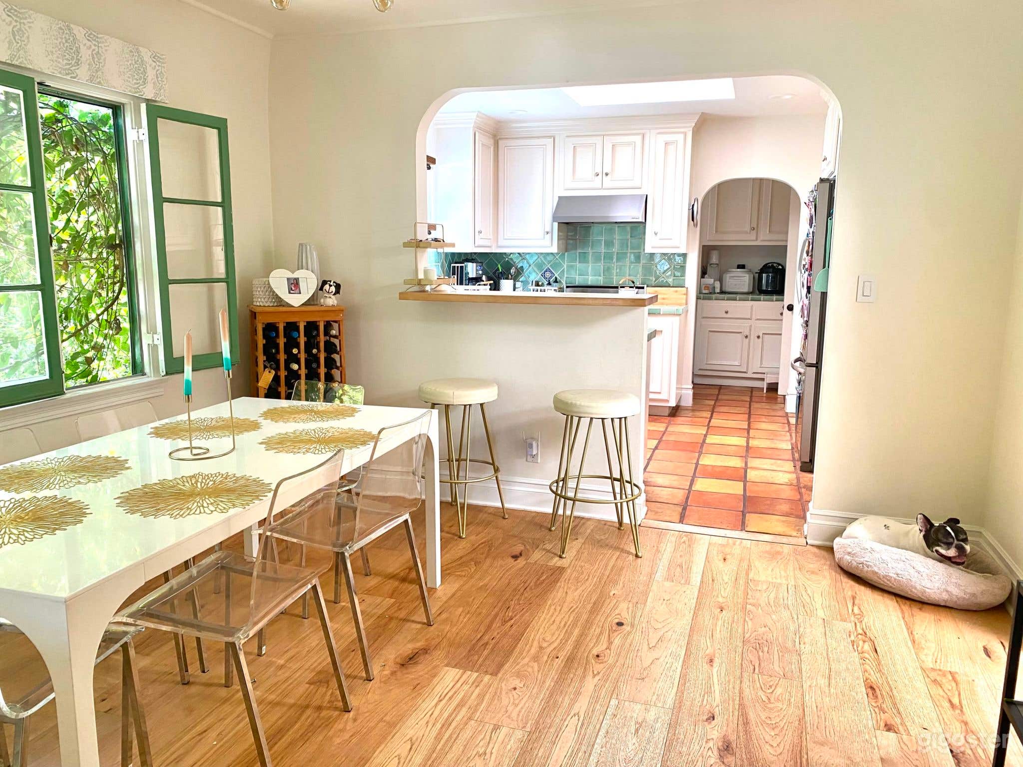 Enchanting Spanish-Style Home with Lush Greenery and Treehouse Photo 3