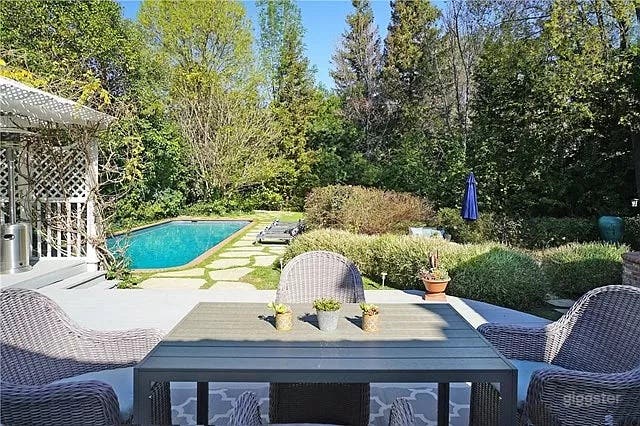 Mesmerizing Pool, Gazebo, and Manicured Oasis Photo 4