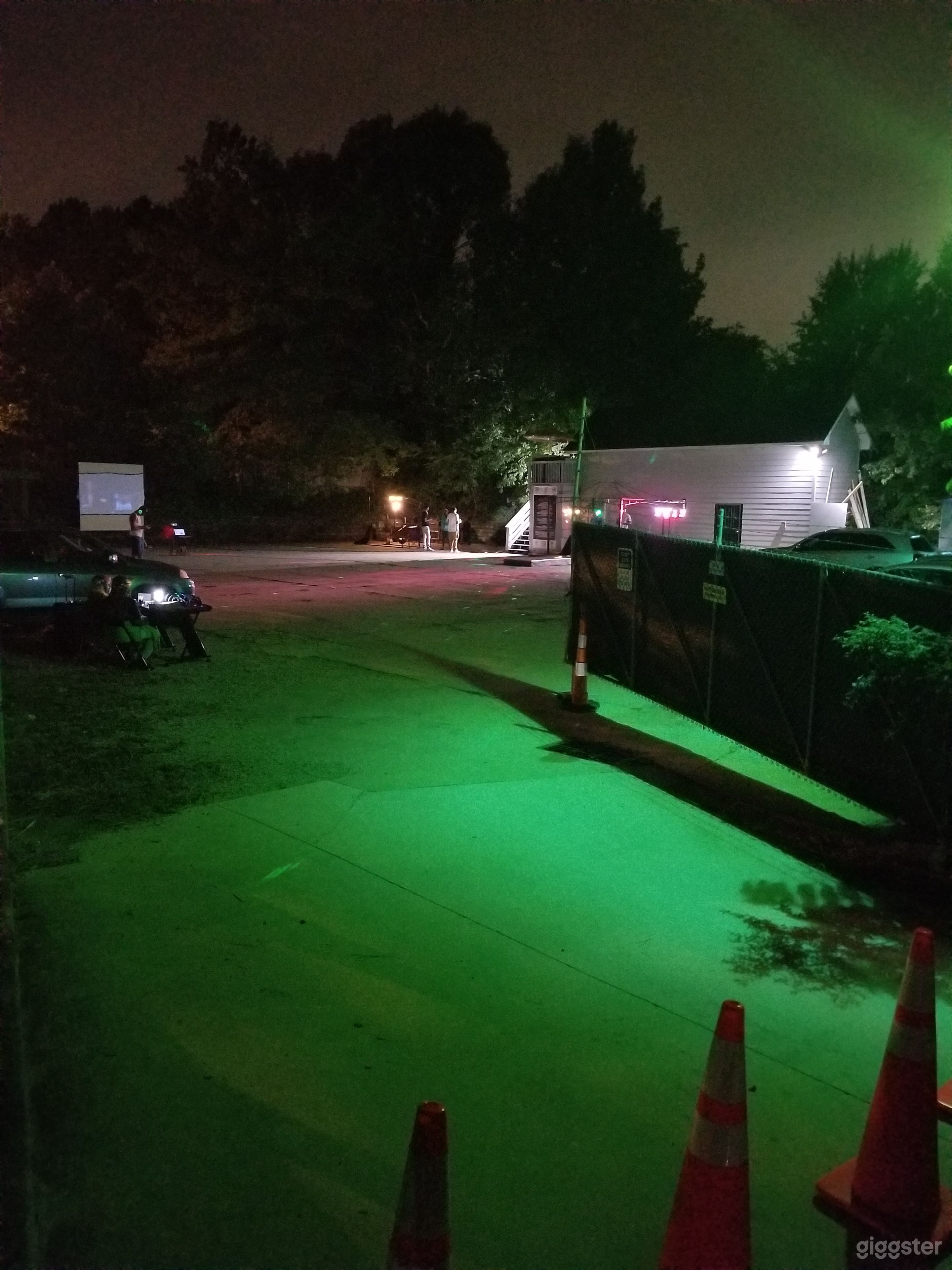 Outside Parking area that doubles as outside event space.  Completely fenced in, holds about 500 people or up to 30 vehicles. 