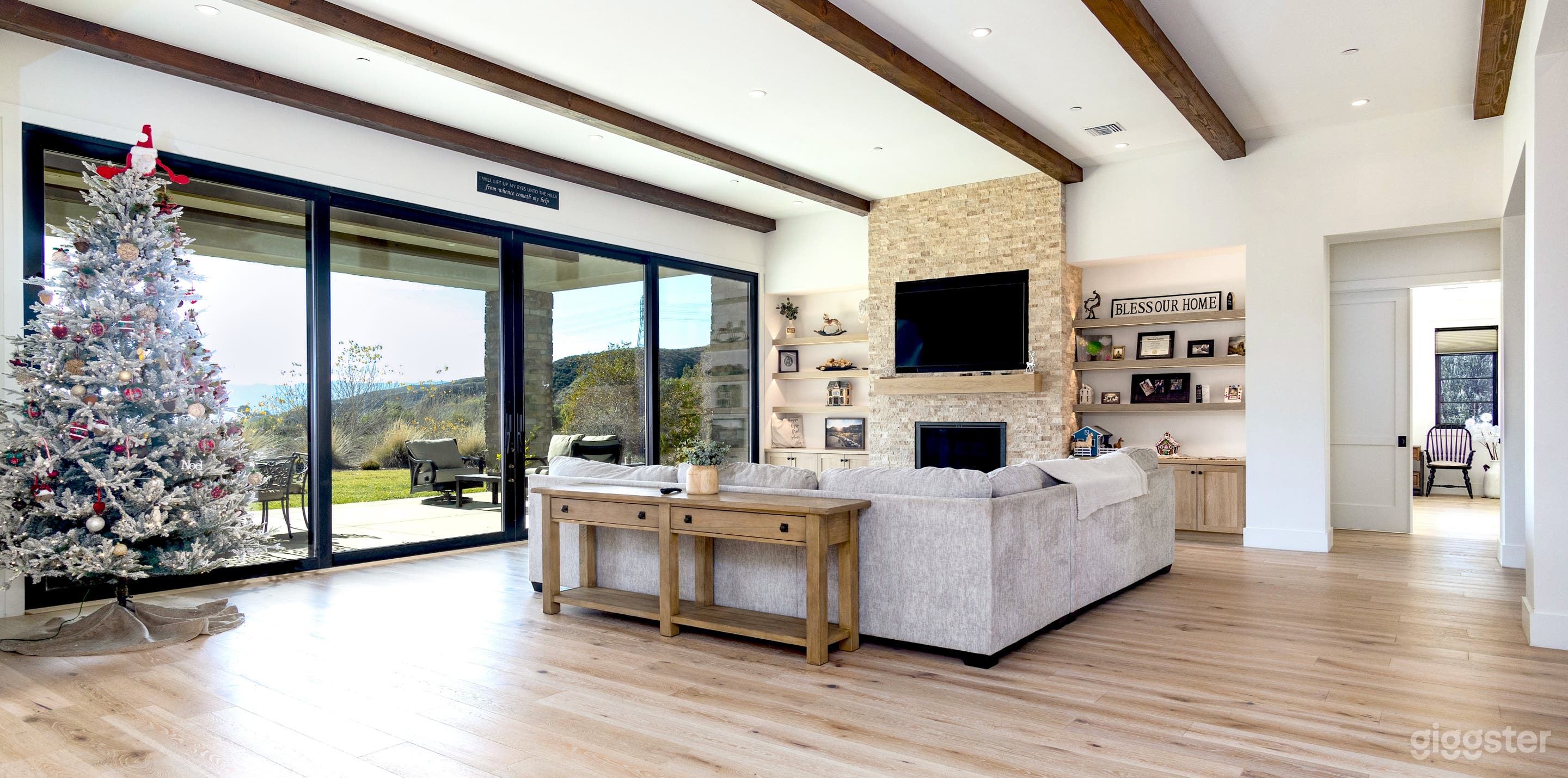 Living room with view to primary bedroom