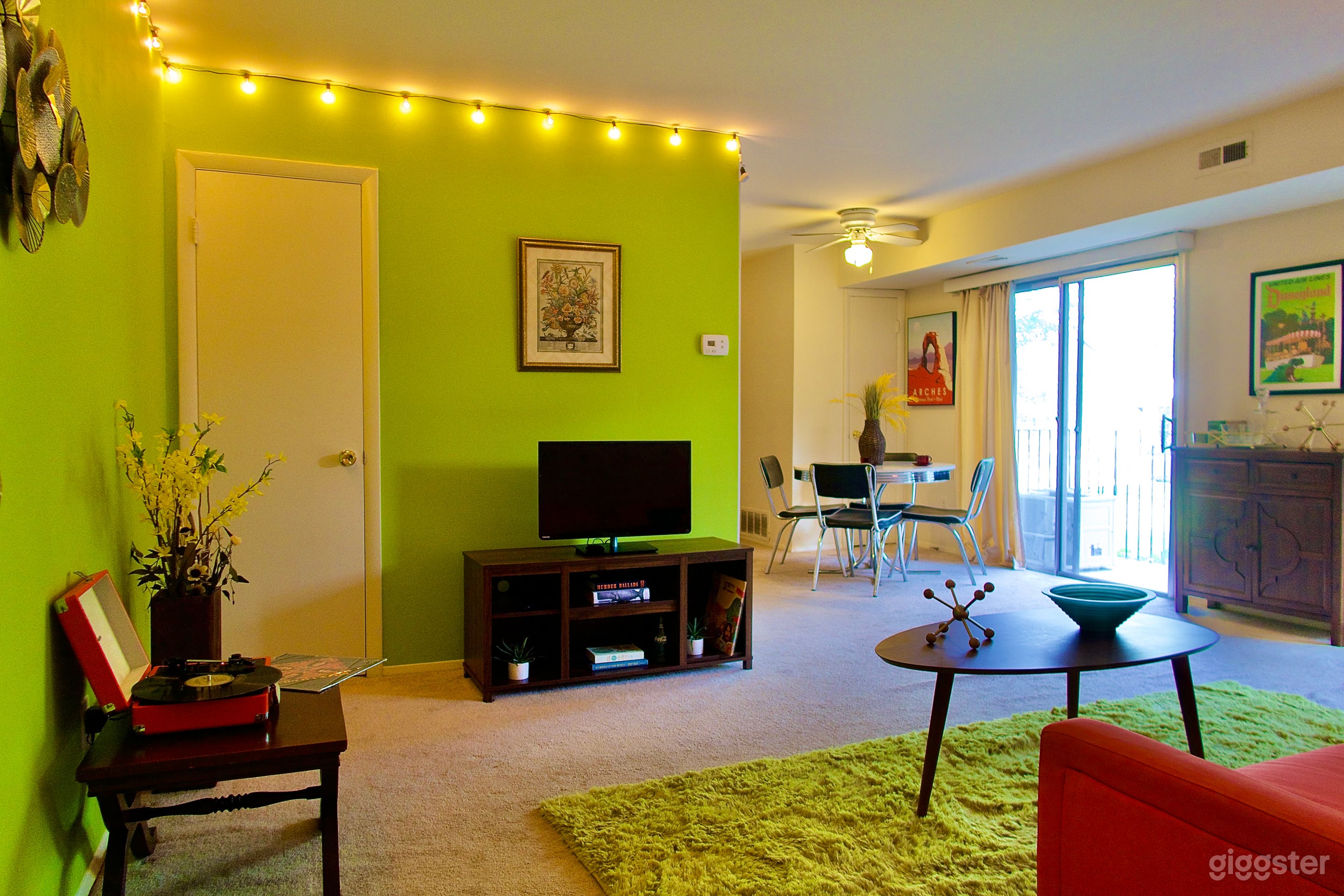 Main room with Record Player, TV, and Mini Bar