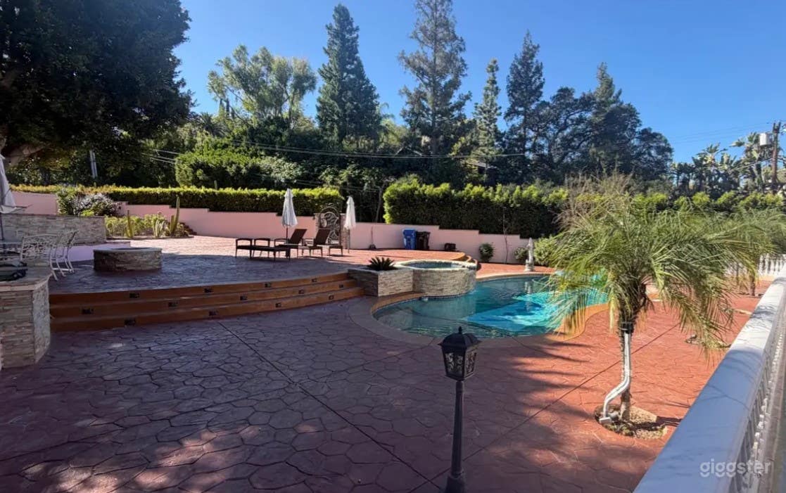 Resort Style Pool with Spacious Patio Photo 1