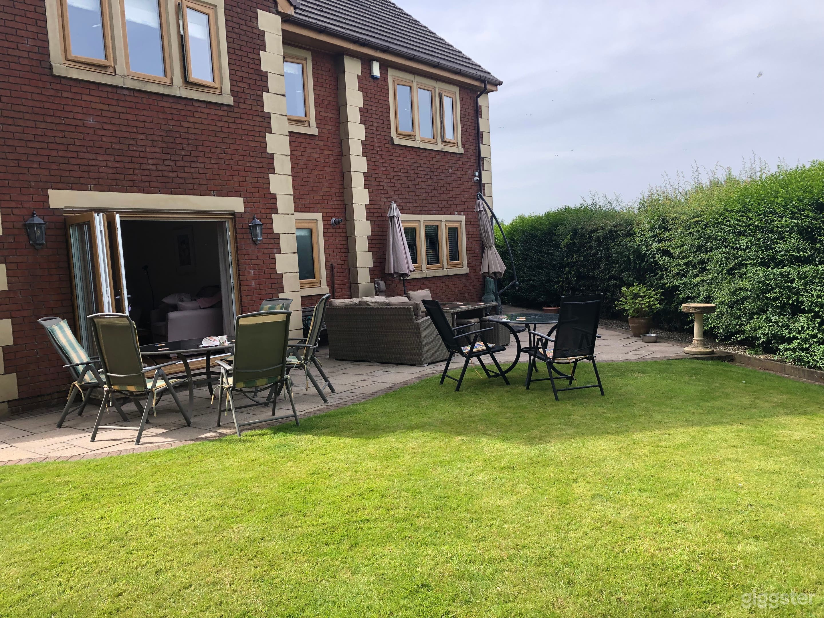 Brick Home w Garden View Photo 1