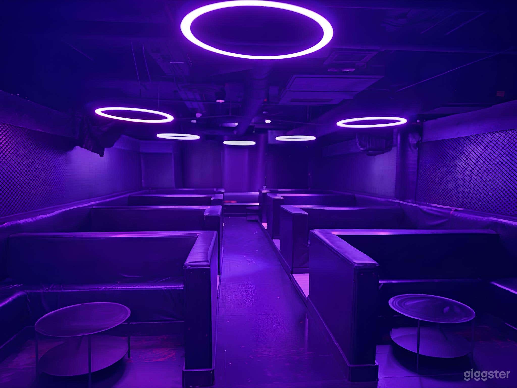 Neon-Lit Lounge Booths Party Bar Section: A Photo 1