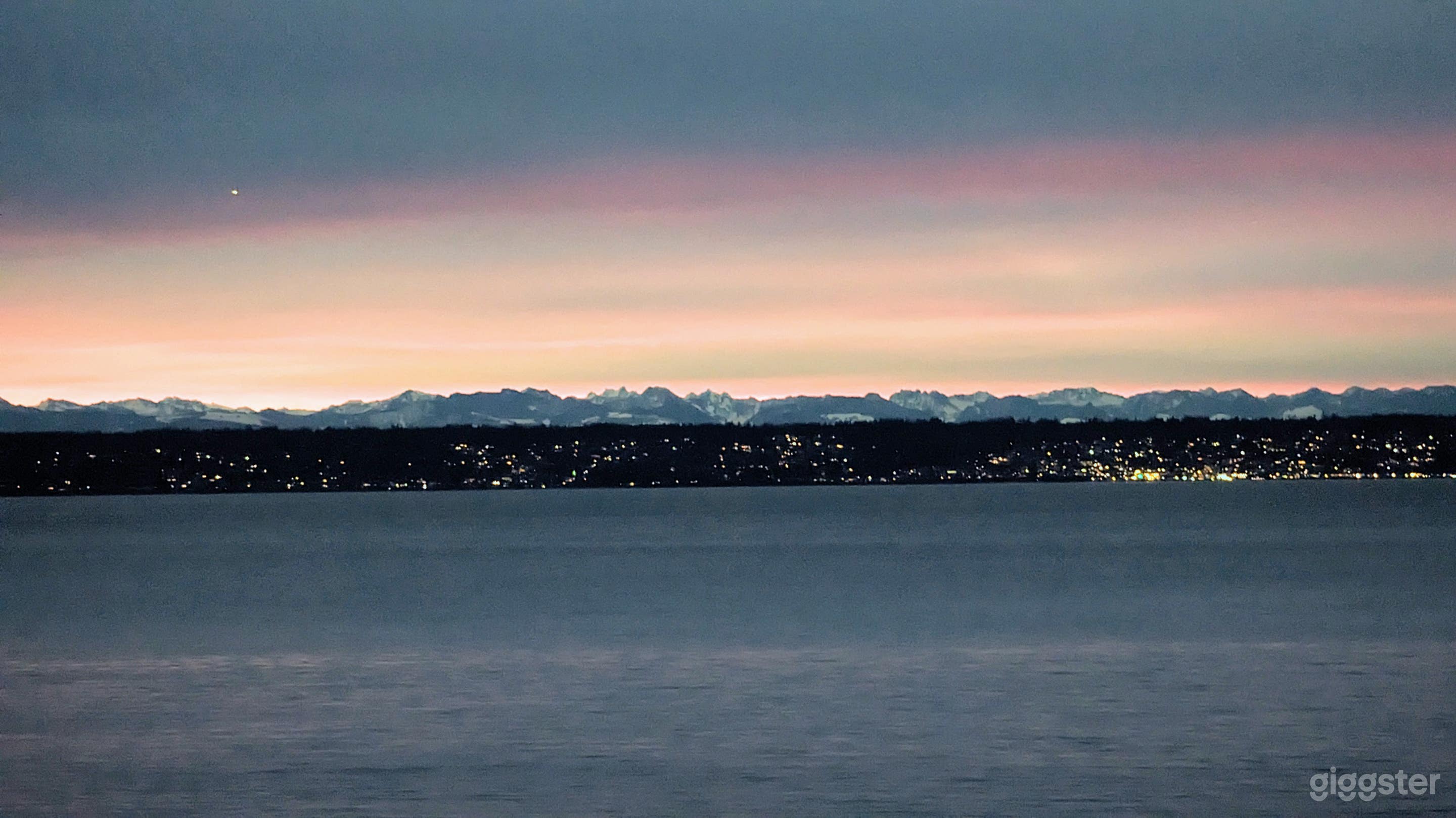 Sunrise over Puget Sound. This is the view in front of the 4 fir trees. This part of the world is know for gorgeous sunrises. 