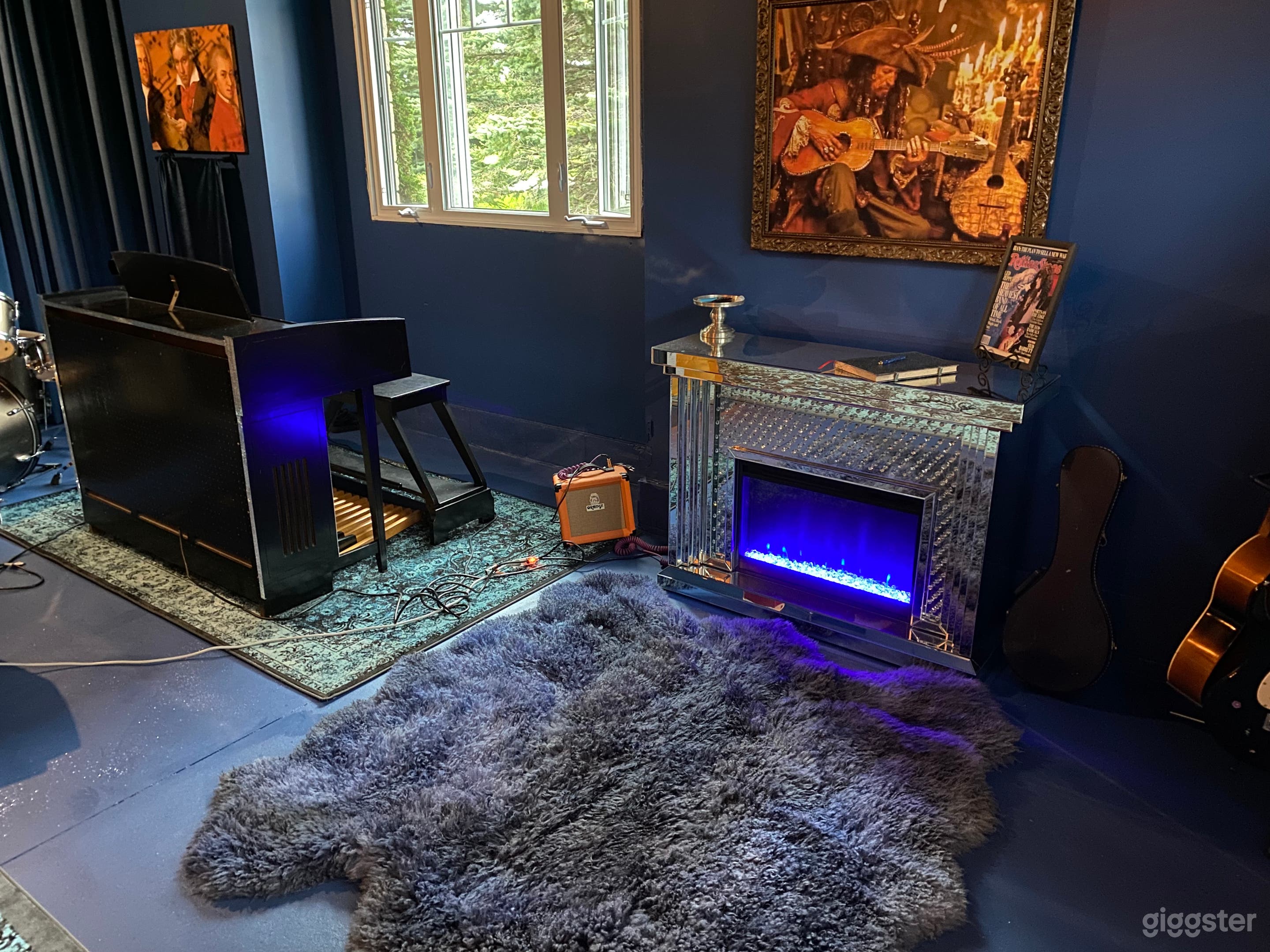 Mirrored fireplace with multi-coloured LED