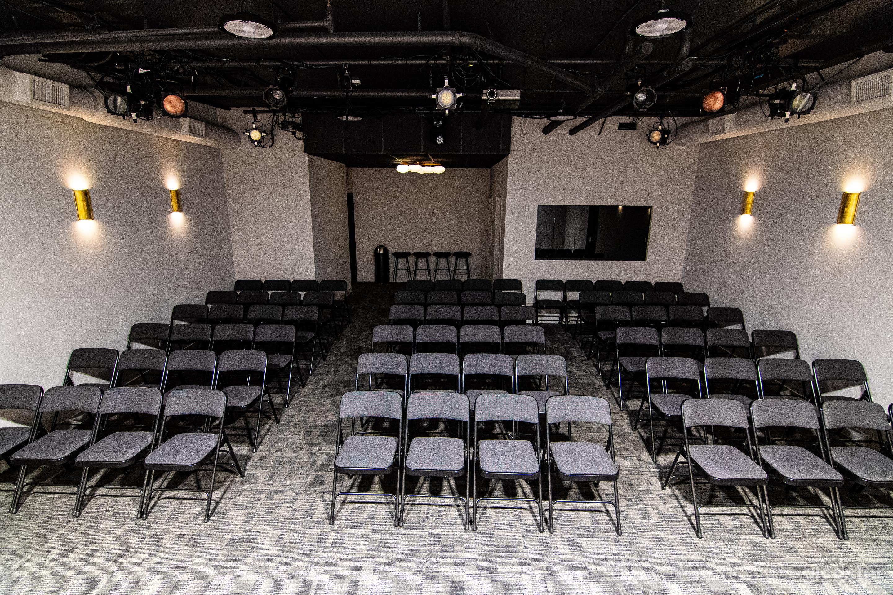 With a capacity of up to 75 guests, this elegant theatre is designed to create an immersive experience for your audience.

Featuring a state-of-the-art lighting grid and a fully equipped sound console, the space is ideal for any event.