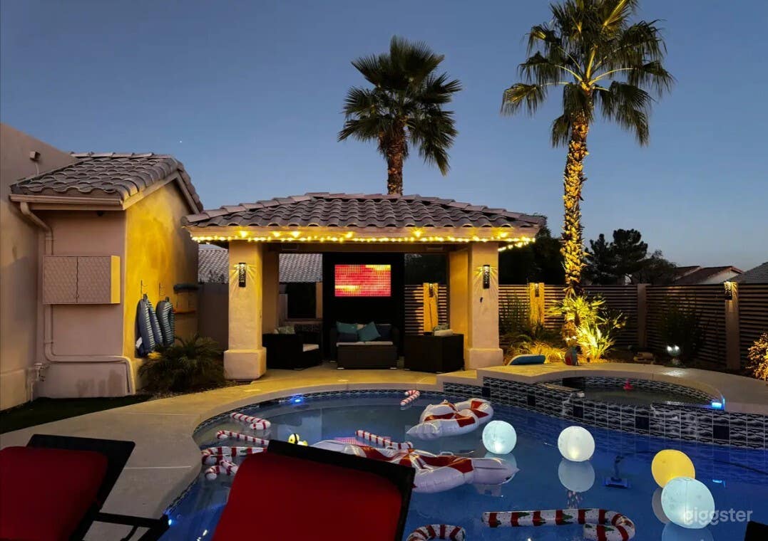 Modern Backyard Oasis with Scenic Pool Photo 1