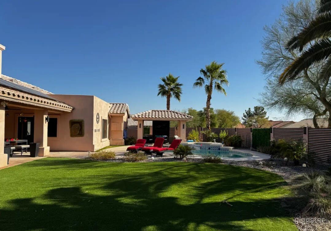 Modern Backyard Oasis with Scenic Pool Photo 2