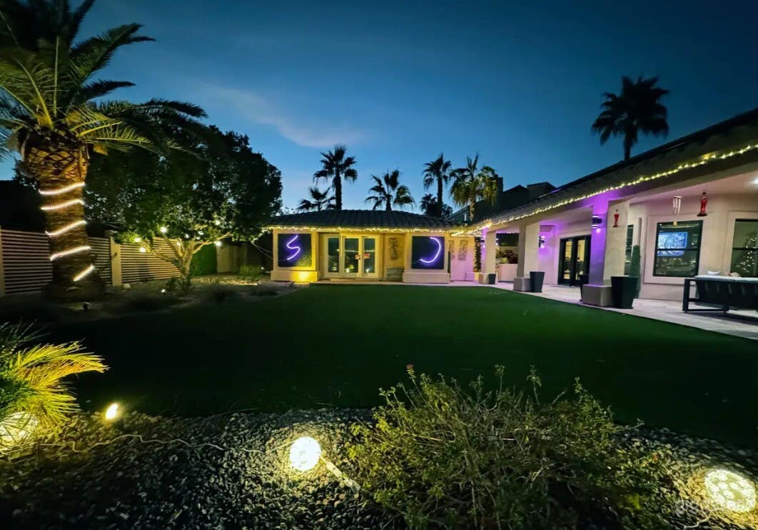 Modern Backyard Oasis with Scenic Pool Photo 4