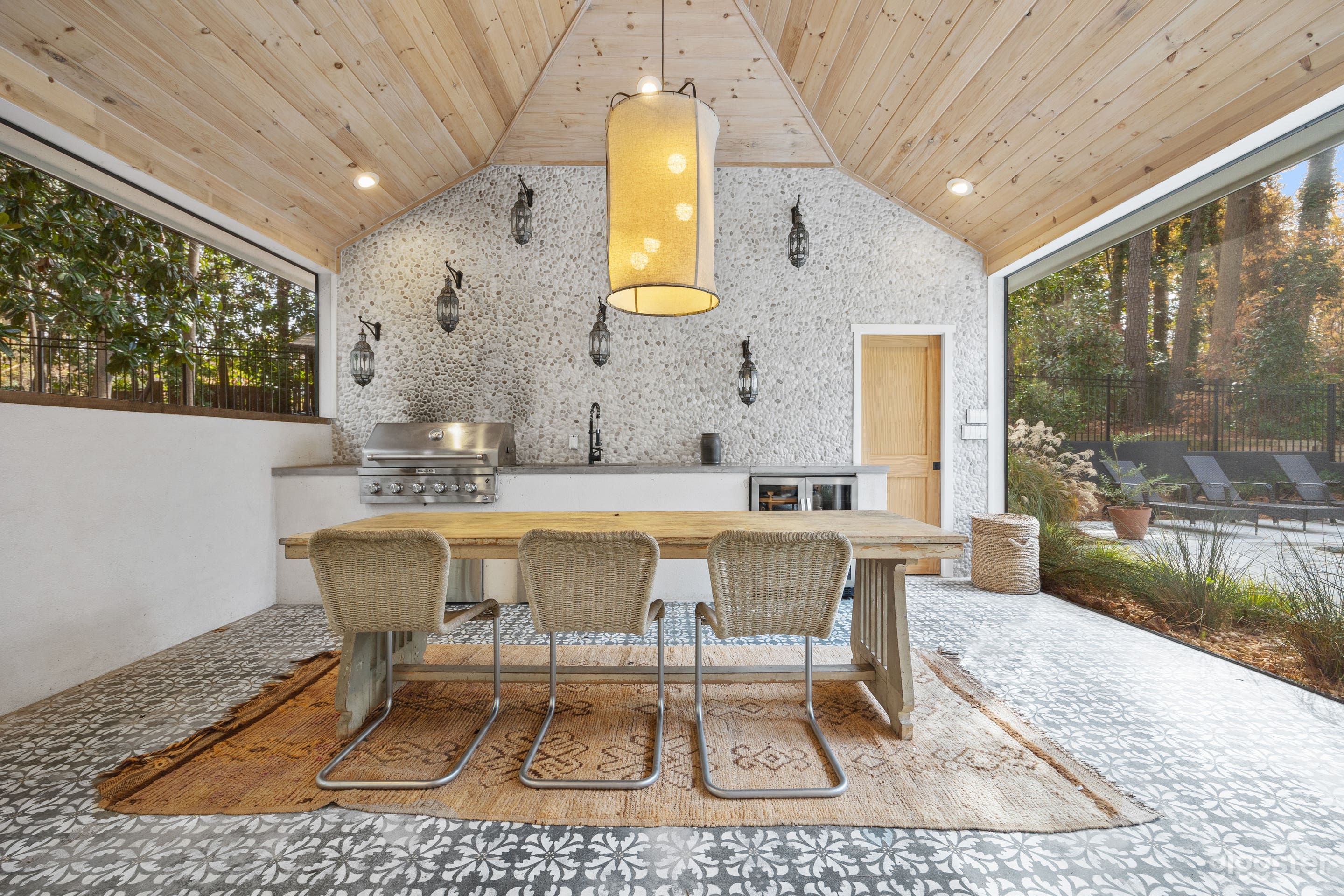 Large dining area in pool house overlooking the pool.  Perfect for entertaining.