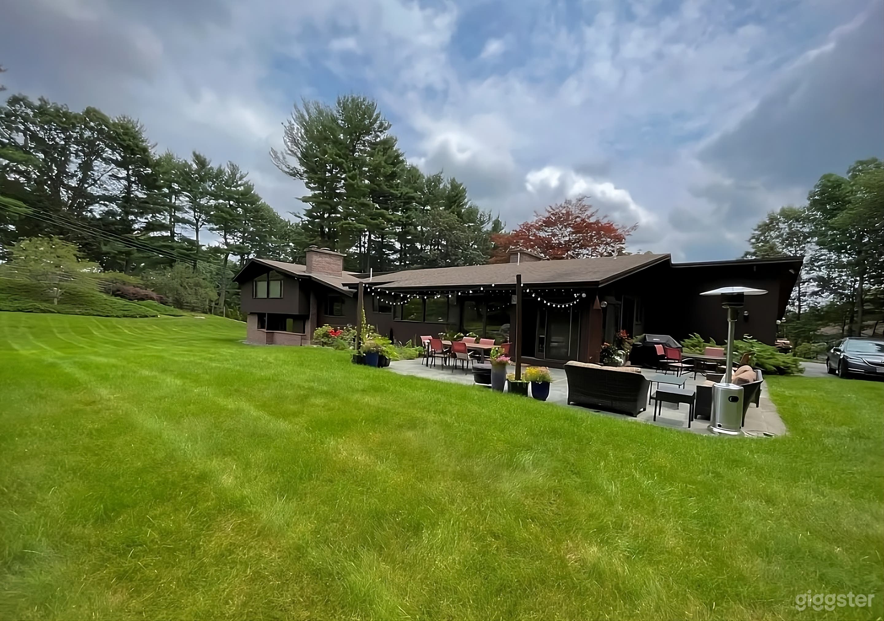 Spacious Lawn and Patio Backyard Retreat Photo 1