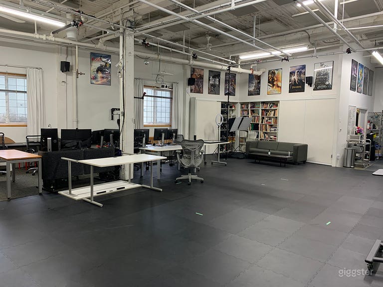  Sliding acoustic panels exposing Library Bookcase Wall 