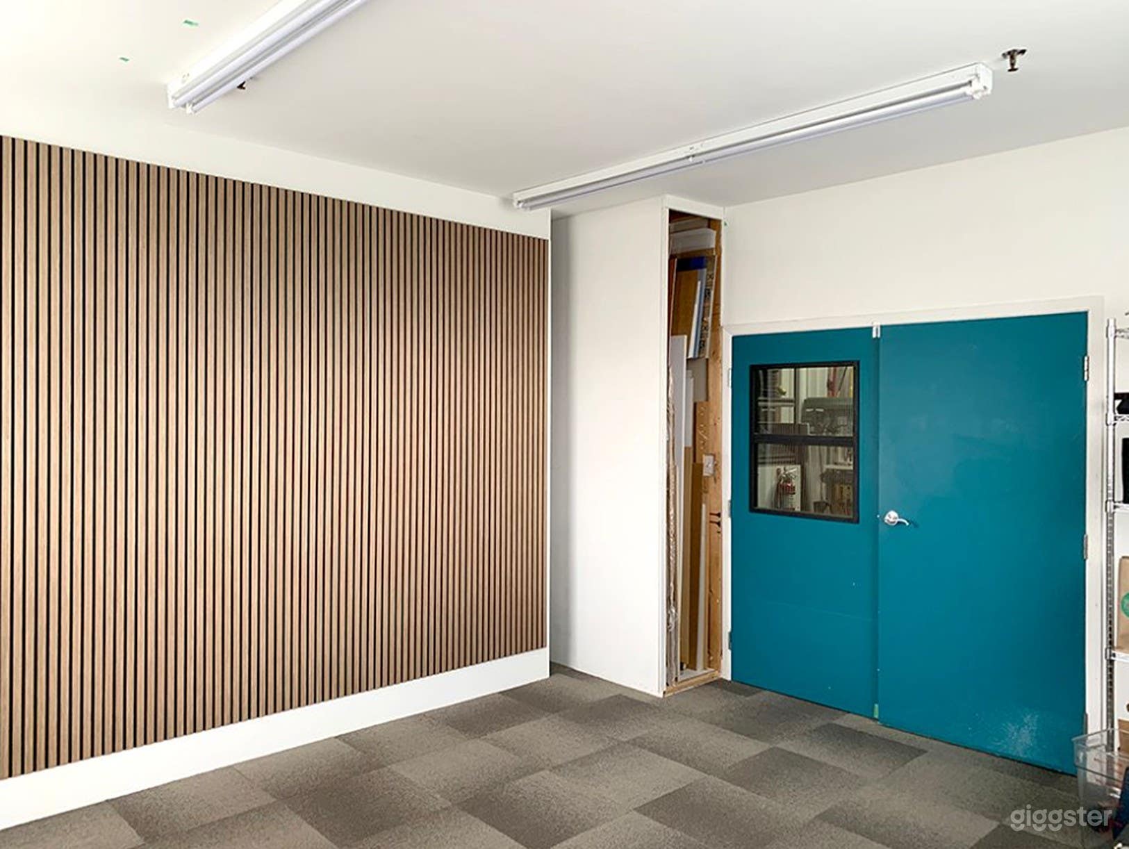 Podcast/Multipurpose Room. Acoustic wood panel wall, cork &amp; carpet flooring, sound absorption walls