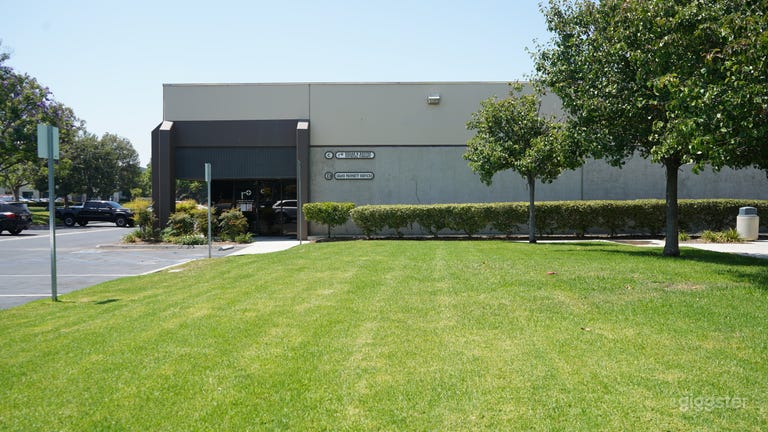  Large grass area nicely landscaped out front of the office. 