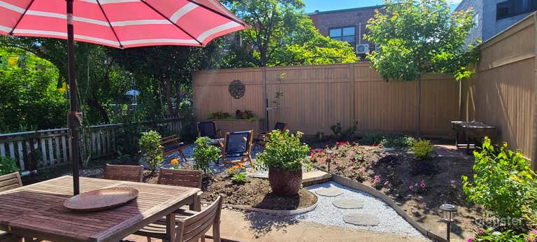  Spacious, landscaped backyard with multiple seating areas 