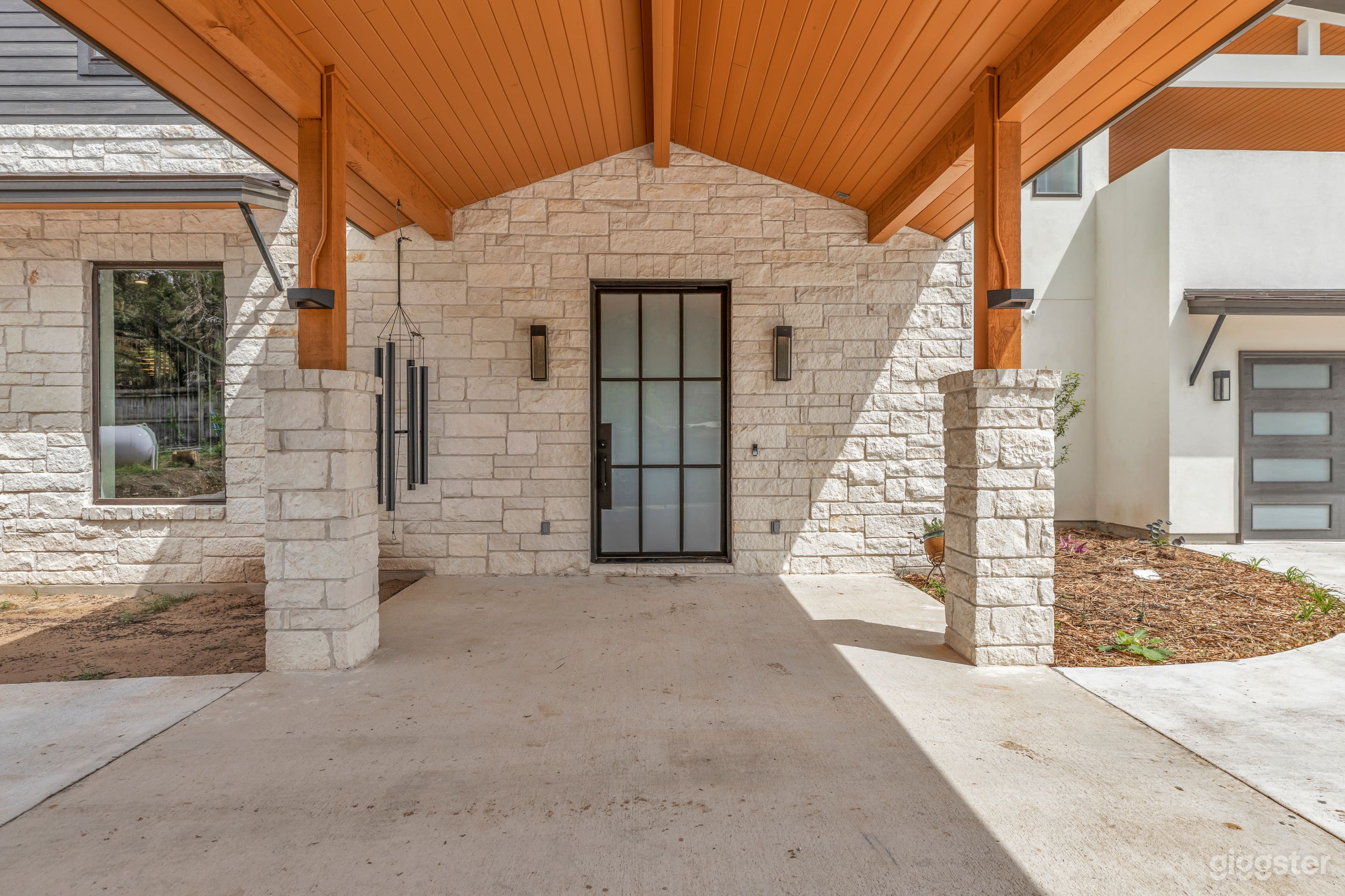 Covered entry with 8ft custom metal/glass entry, three different lighting options.