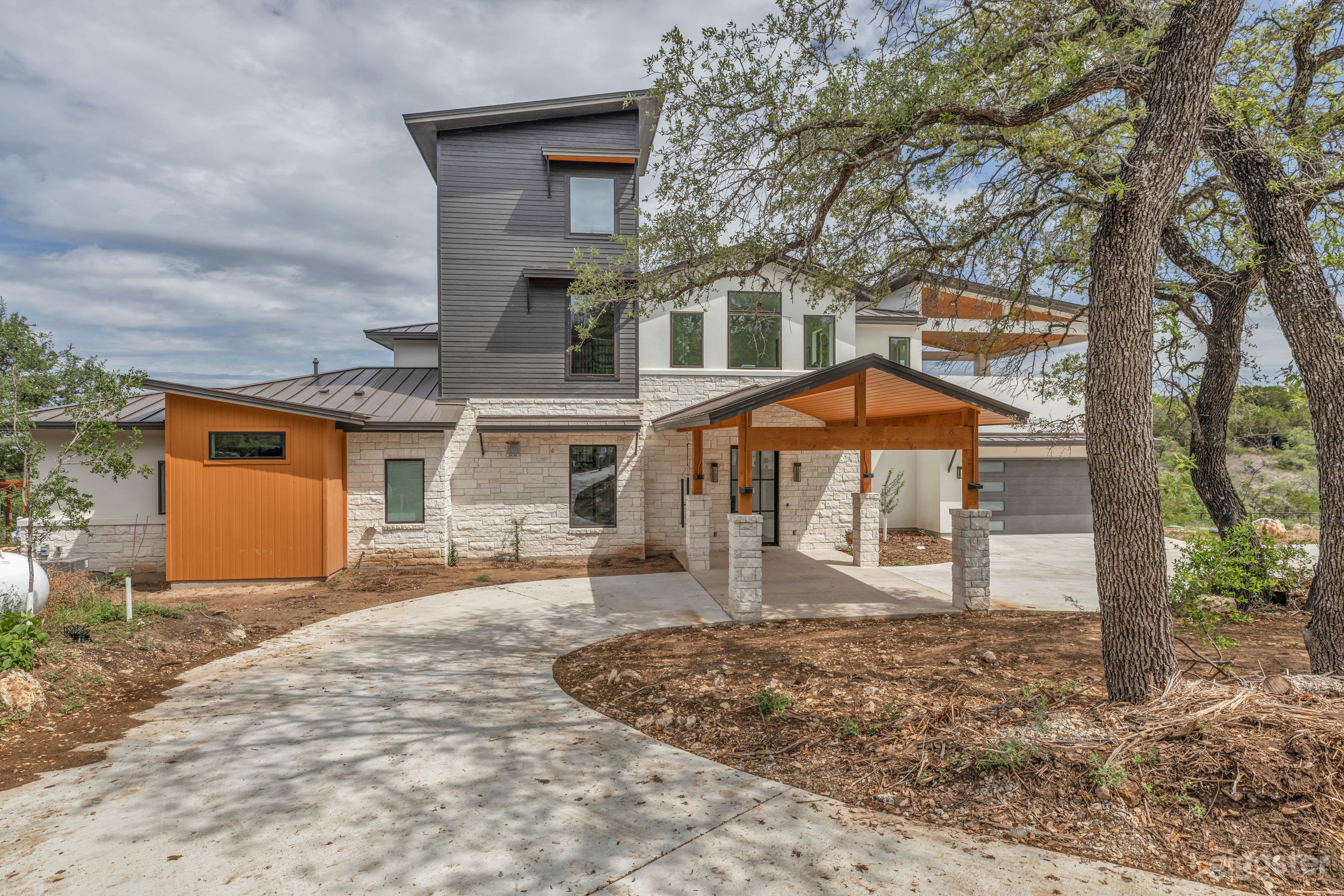 Covered entry, three story library, 2nd floor tiled and covered porch with sweeping views!