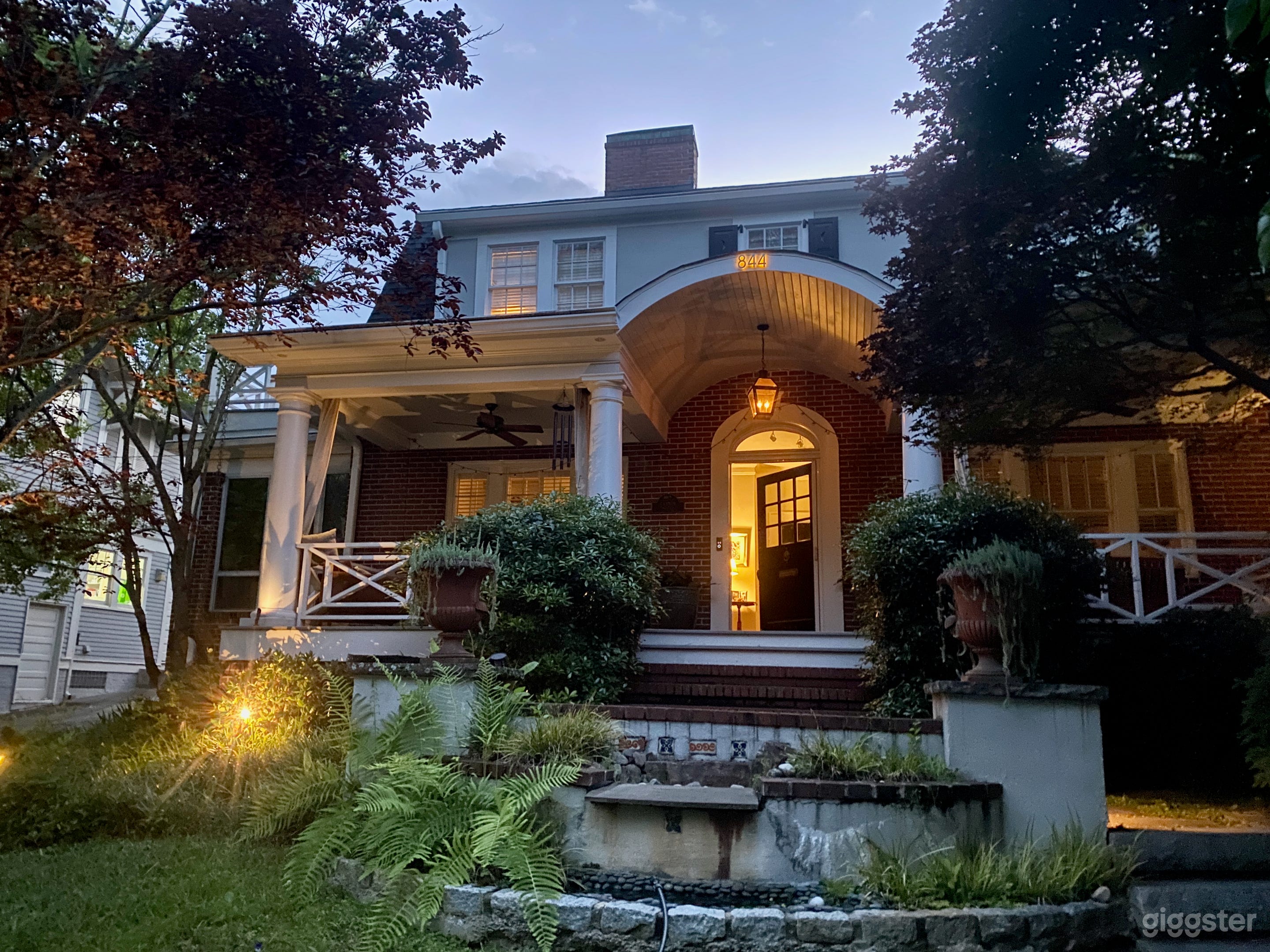 front of the house at dusk