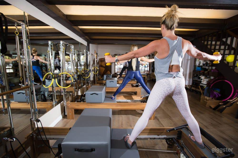 Naturally Lit Pilates Studio in Lush Green Setting Photo 3