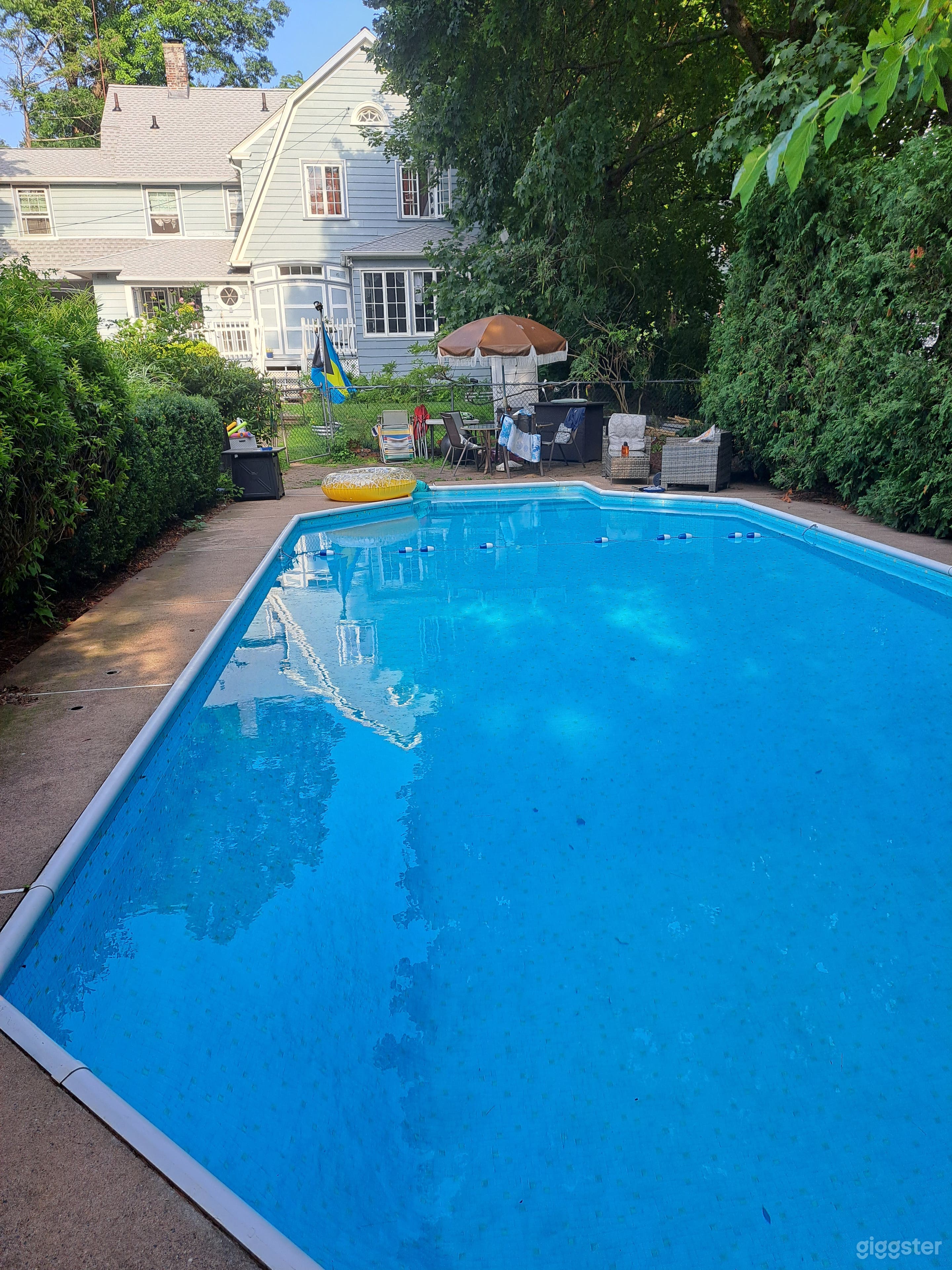 Timeless Charm: Poolside Retreat Photo 2