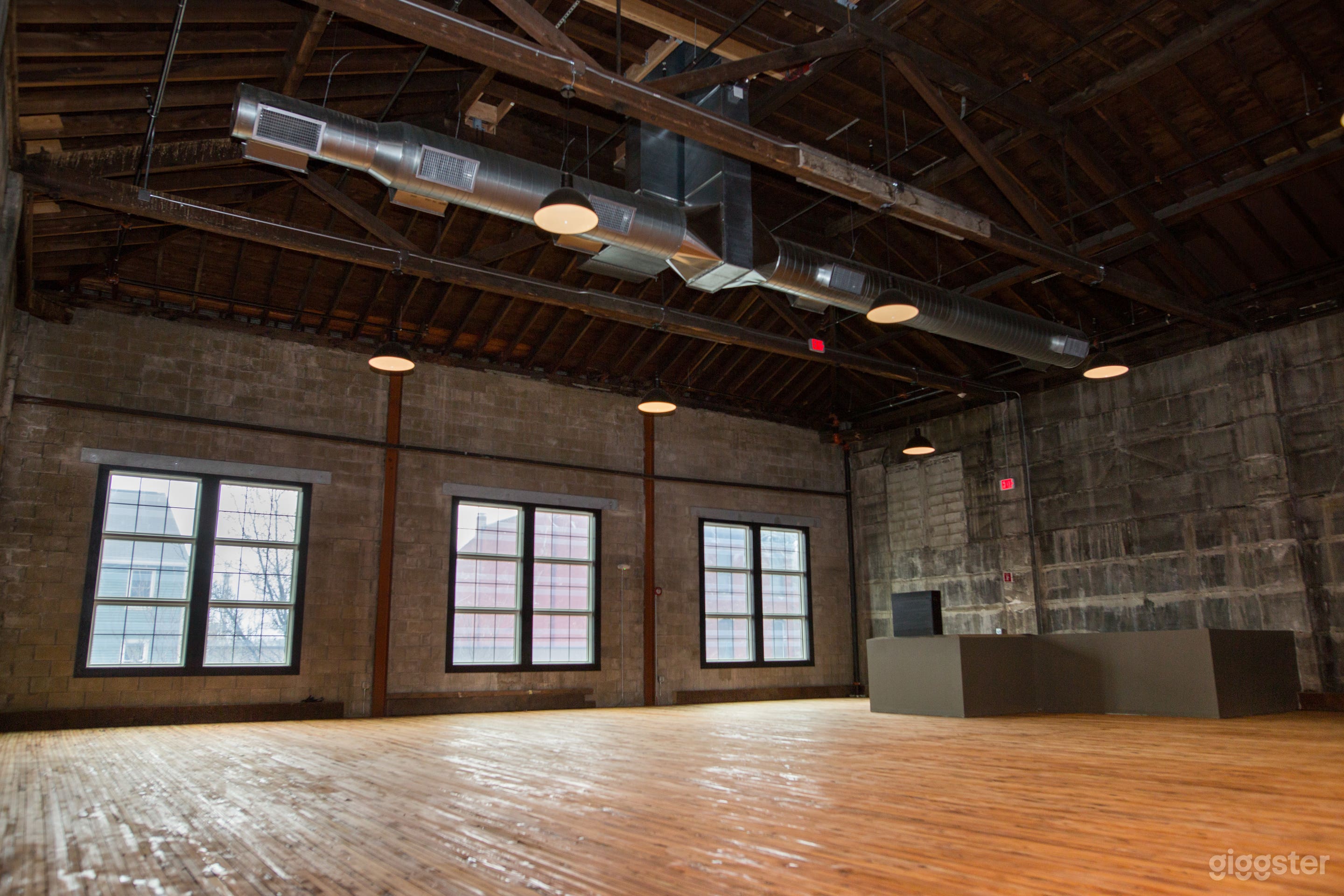 Three large windows for great natural light which can also be draped for control.