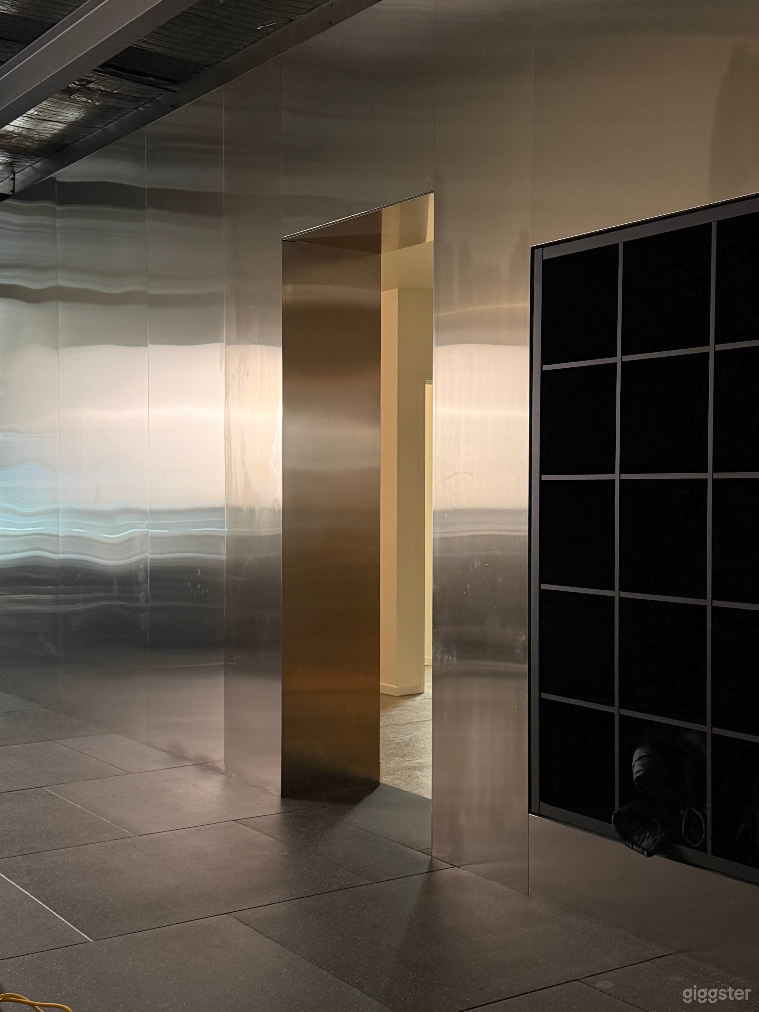 Designer Gym Space | Sleek Chrome and Beige Aesthetic Photo 1