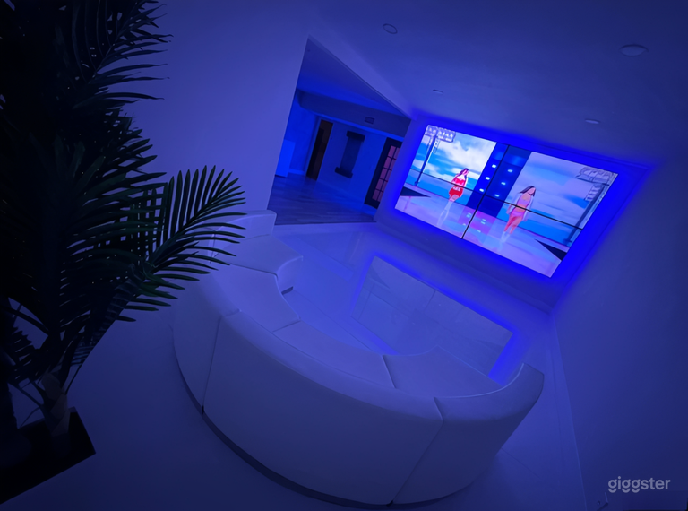  Espace événementiel blanc moderne avec mur TV LED 