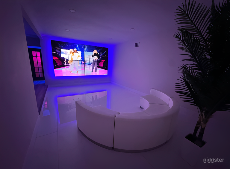  Modern White Event Space with LED TV Wall 