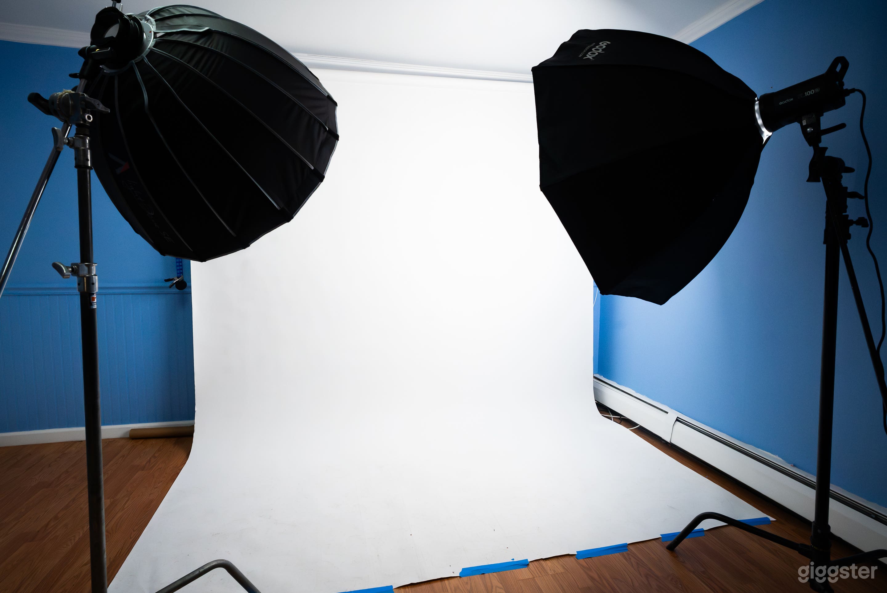 White Backdrop can be used for photoshoots or videos. RGB Lighting can be used to change the color of the set
