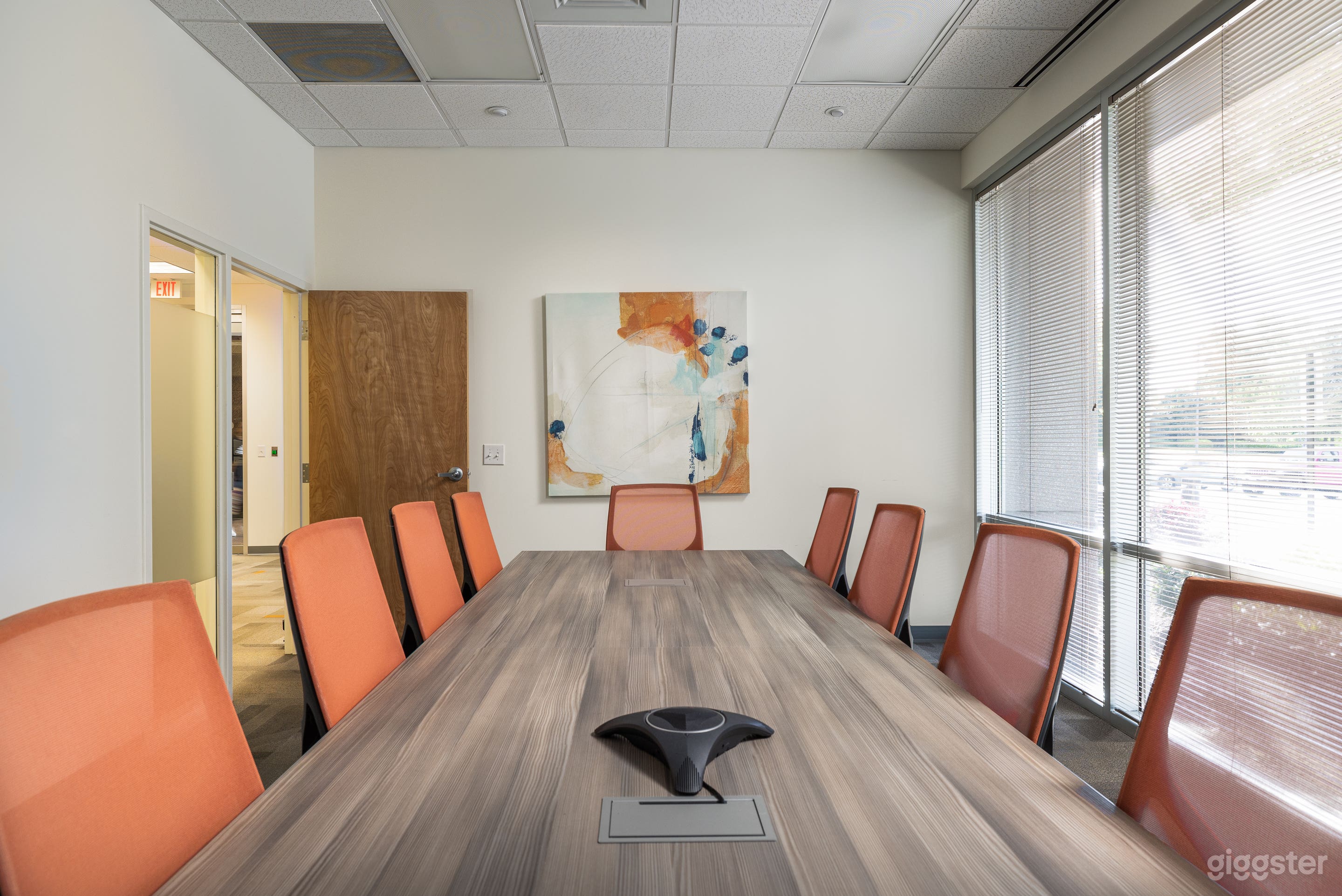 Vibrant Boardroom with Window View Photo 3