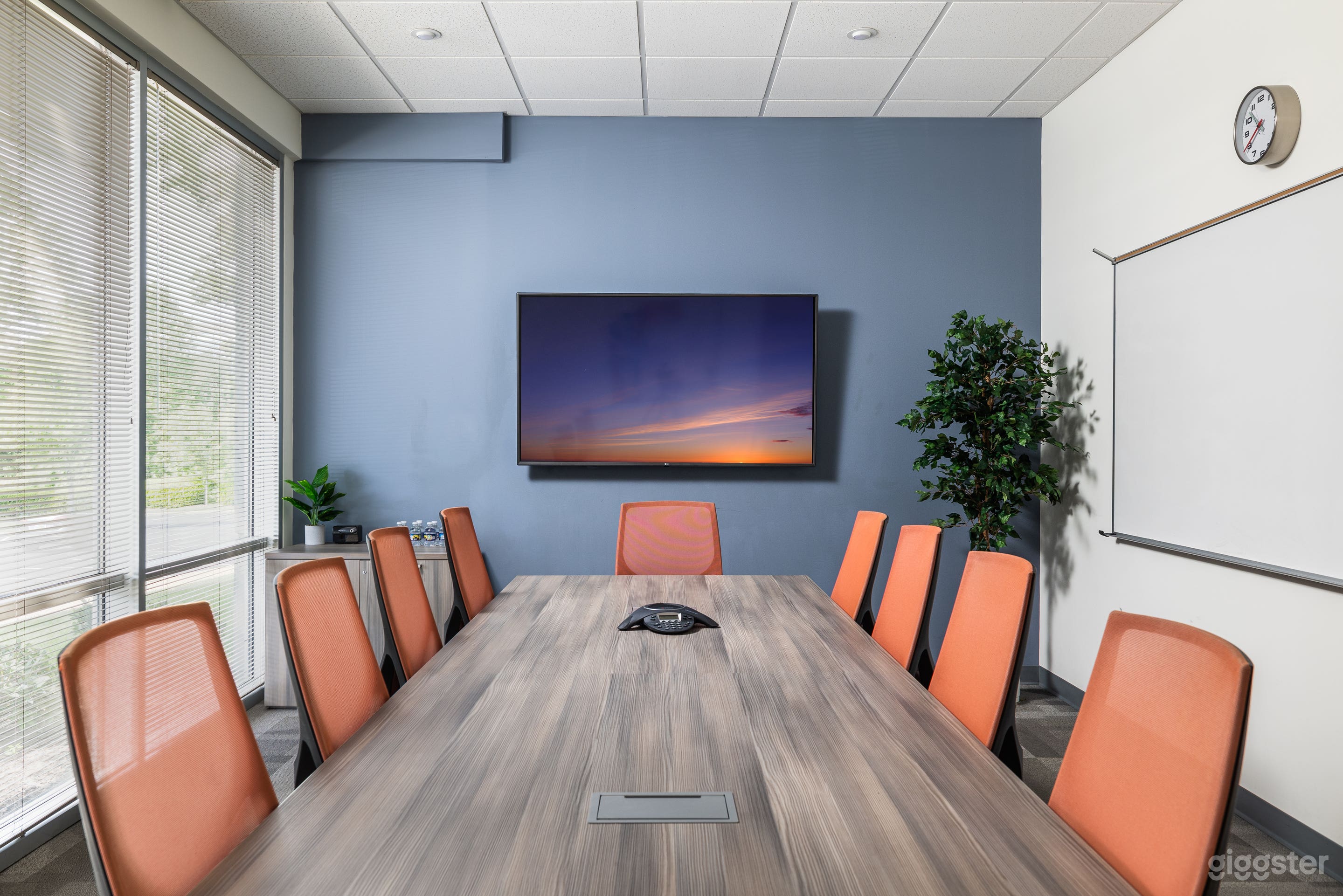 Vibrant Boardroom with Window View Photo 1