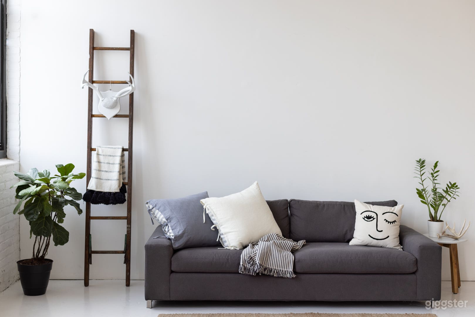 Front couch/lounge area with east facing light