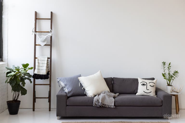  Front couch/lounge area with east facing light 