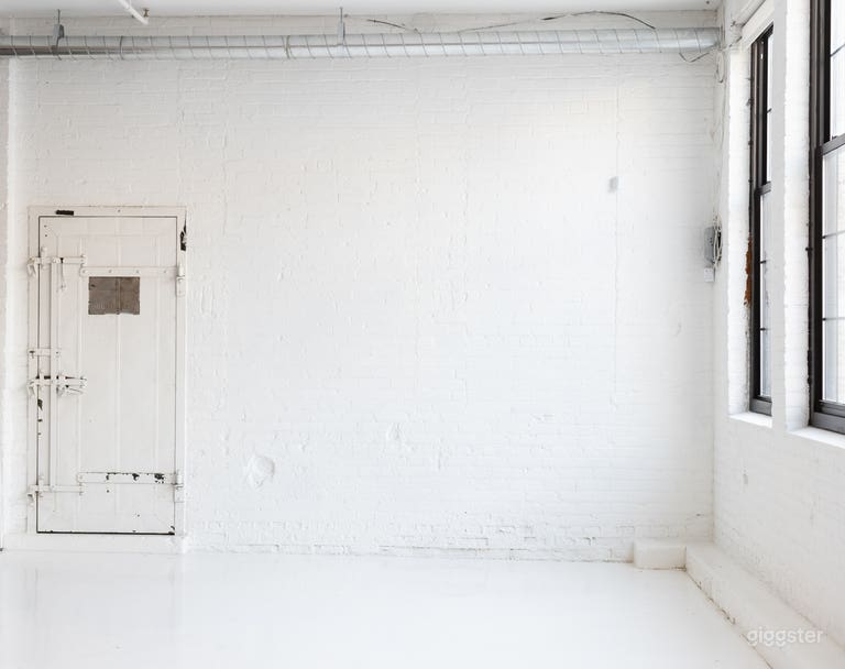  White brick wall with west facing light 