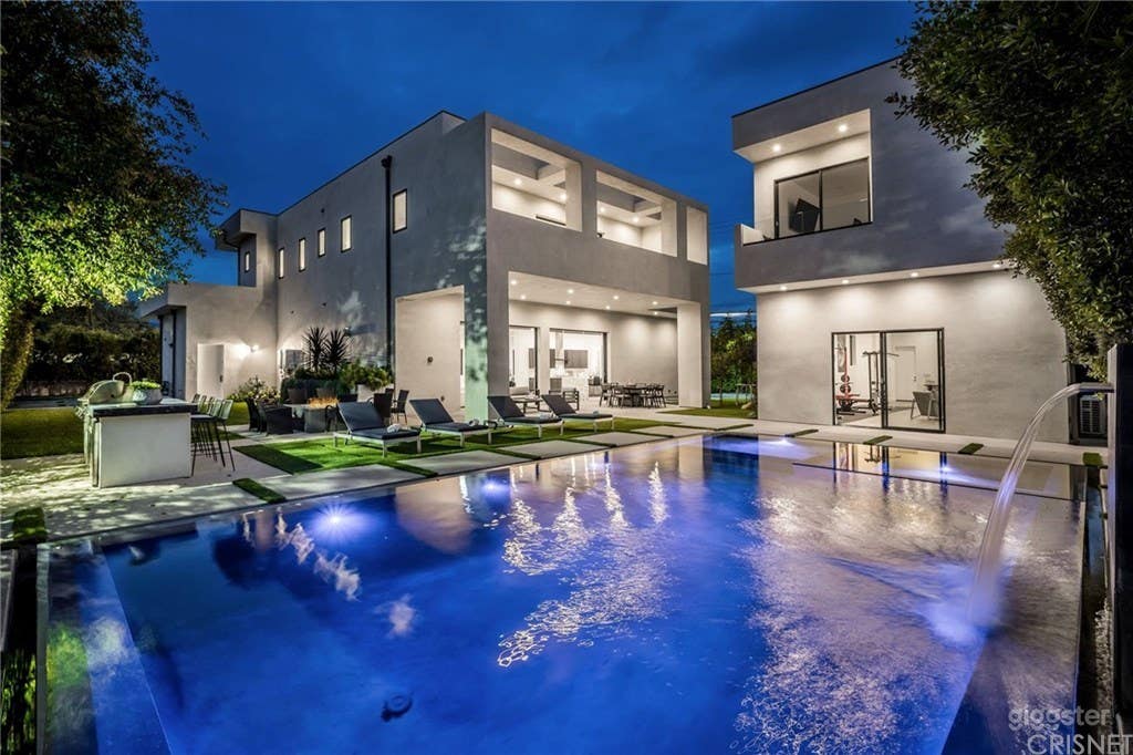 Main Home with Waterfall pool and Adjacent Building