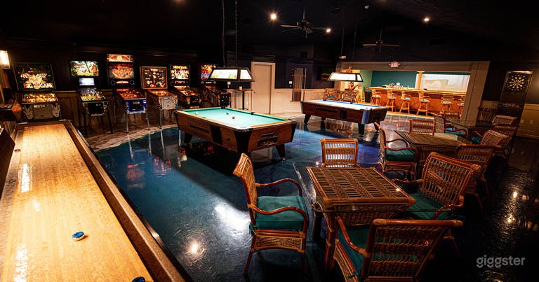  Ocean Room in the event space with pool tables, pinball machines, shuffleboard, and darts. 
