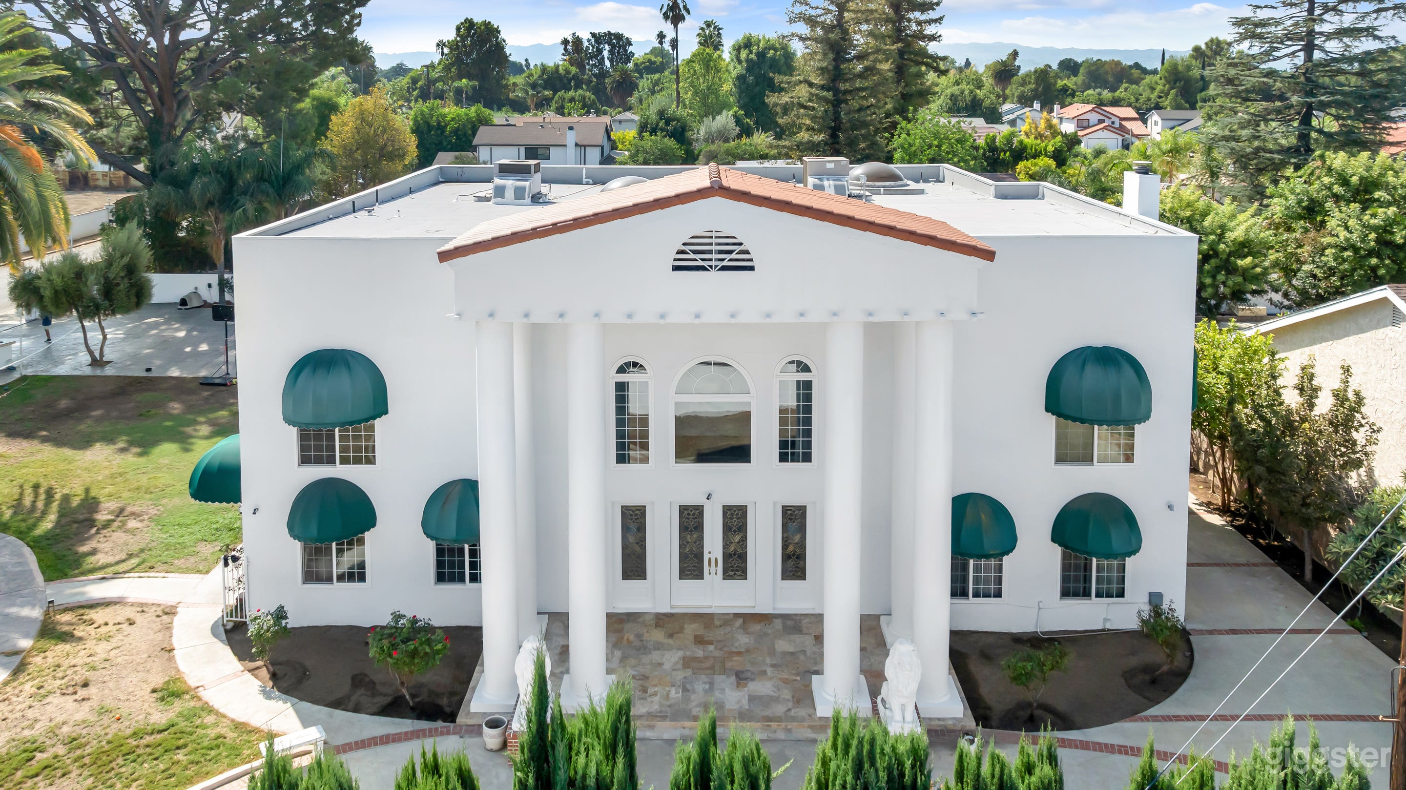 Elvis-Inspired Mansion with Roman Columns, Pool & Ballroom Photo 1