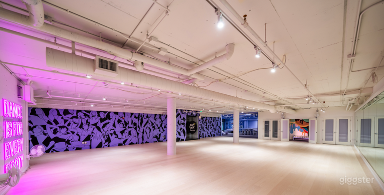  Studio Biggie has a 3,000 sq ft, clean wooden floor with mural, neon sign and one full wall of mirrors. 