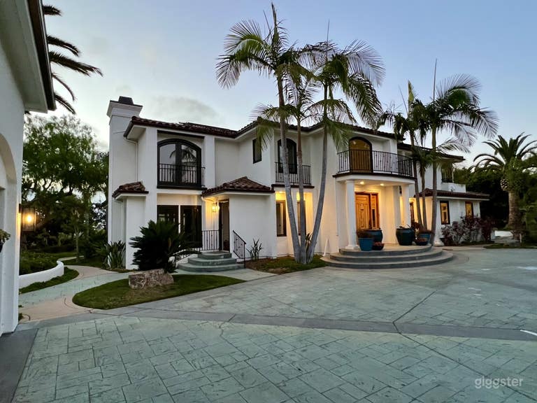  Front of house at sunset. 