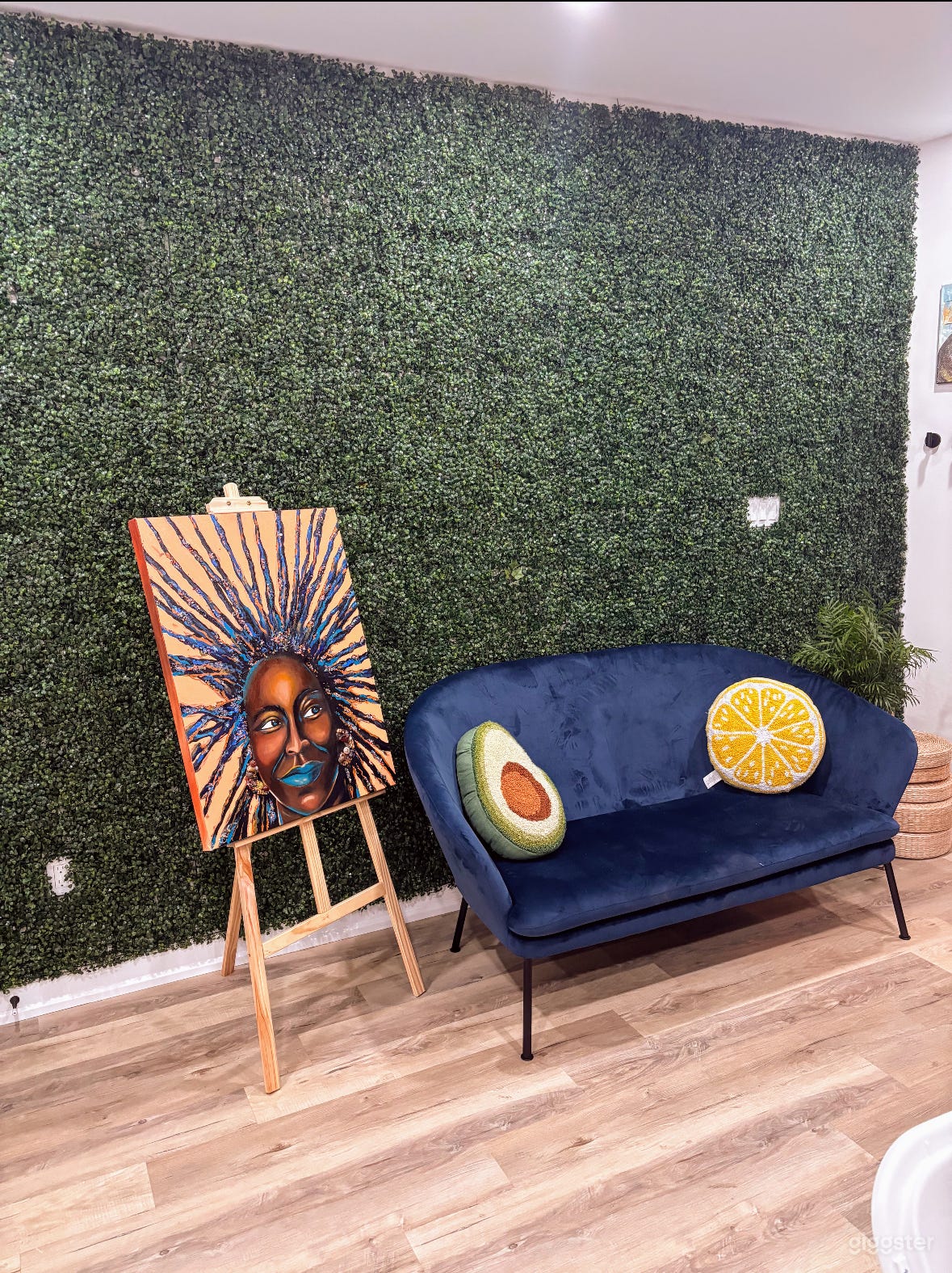 Use of standing easels and blue felt couch 