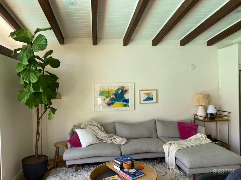  Living room area with post and beam construction 