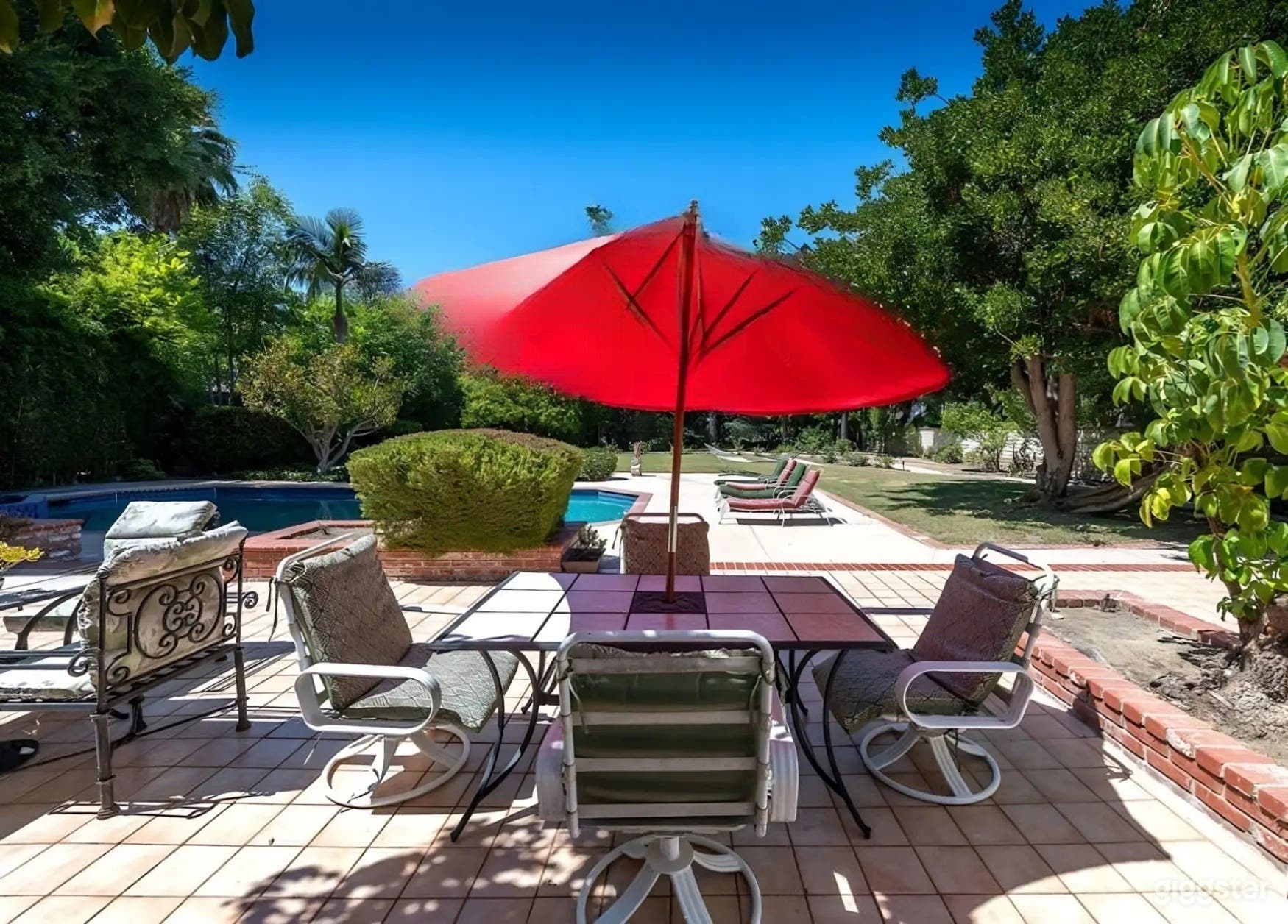 OUTDOOR POOL | GRAND TRADITIONAL ESTATE Photo 2