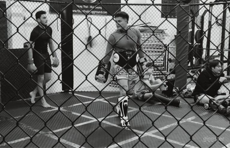  Students training in our MMA cage. 