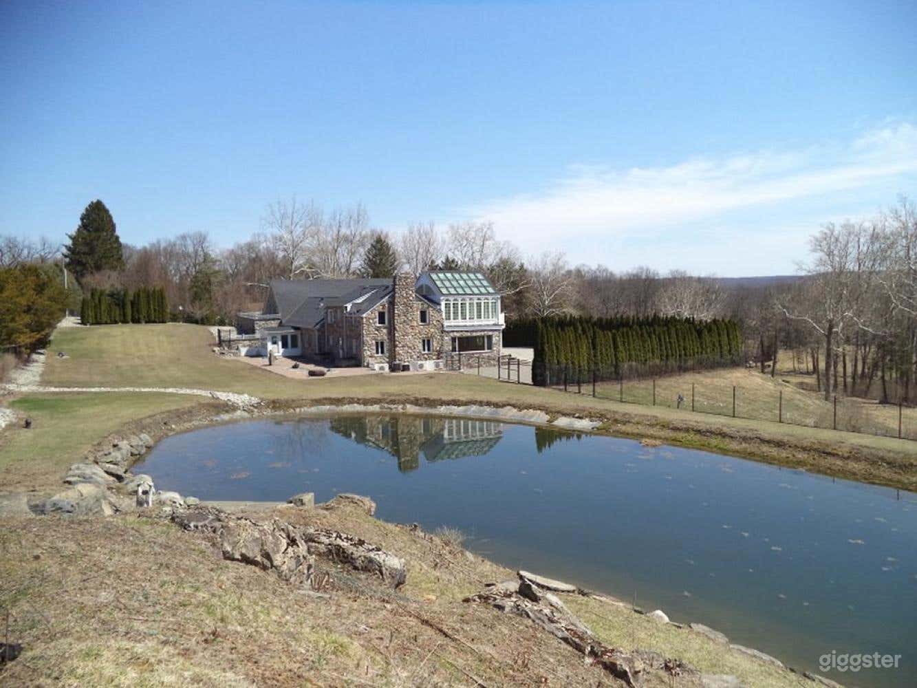 Sprawling, 26 acre pond-front estate Photo 1