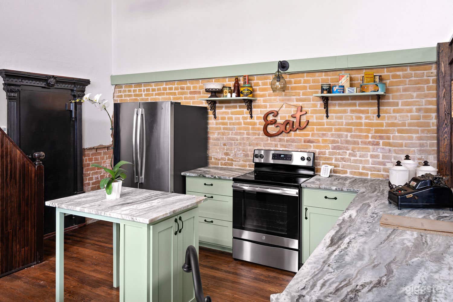 Bank teller area is now a gourmet kitchen.  Notice the vault in the back - that is original.