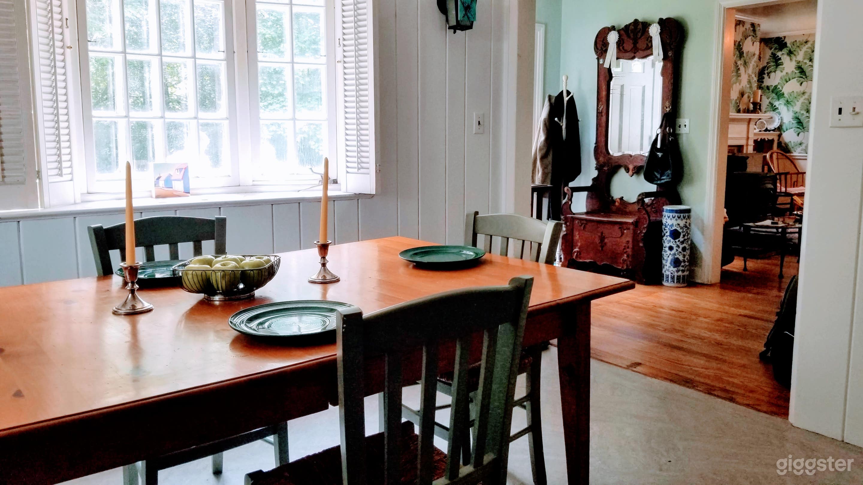 Other side of dining room, view to entry foyer and LR . Shot from breakfast bar.