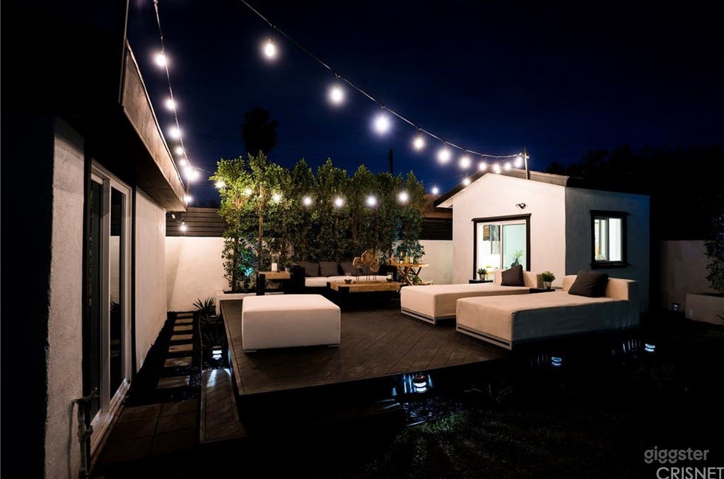 Back yard, lined with ficus trees for privacy